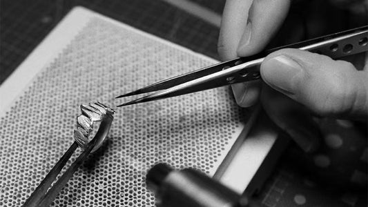Different wedding ring widths shown during the handmade ring making process.
